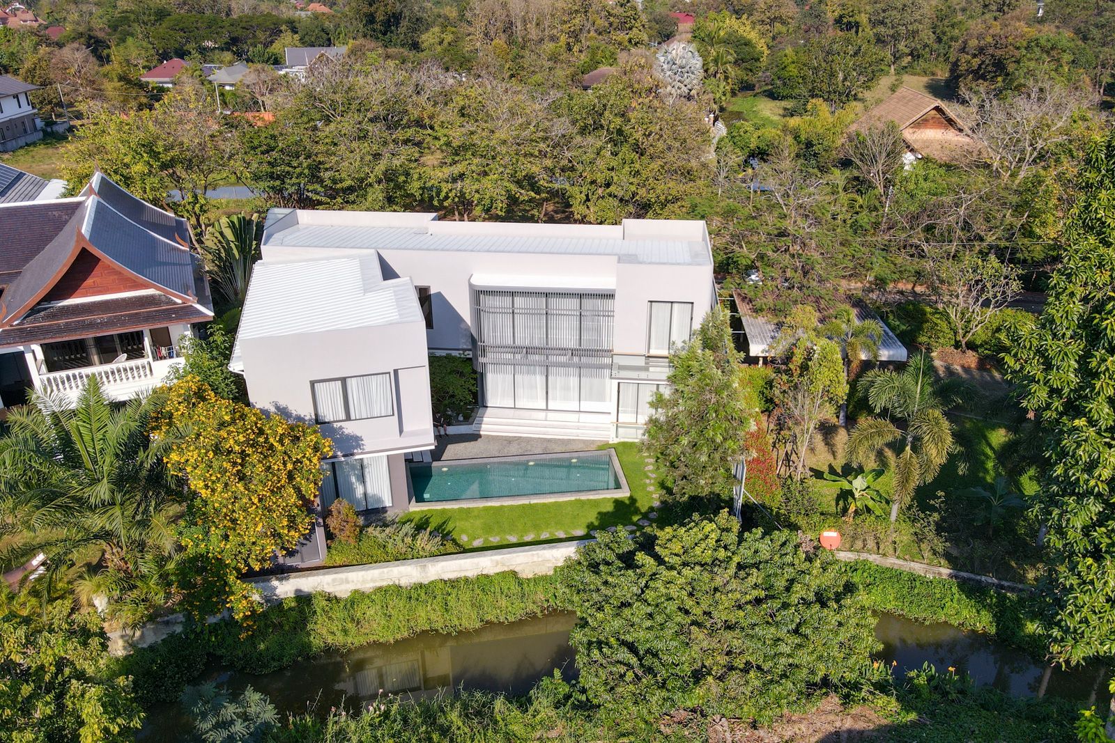 Exquisite 4-Bedroom Villa with Pool & Waterway Views in Doi Saket